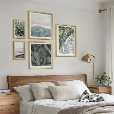 Set di quadri incorniciati con piante tropicali e mare