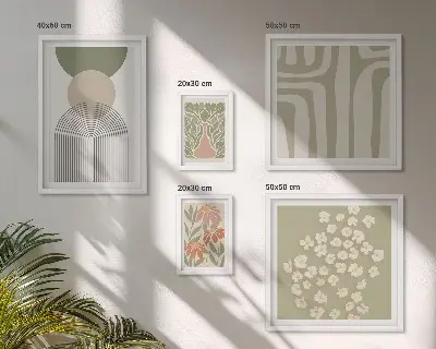 Set di quadri incorniciati con eleganti grafiche floreali dai colori pastello