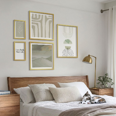 Set di quadri incorniciati Eleganti grafiche naturalistiche dai toni pastello.
