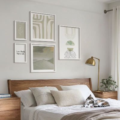 Set di quadri incorniciati Eleganti grafiche naturalistiche dai toni pastello.