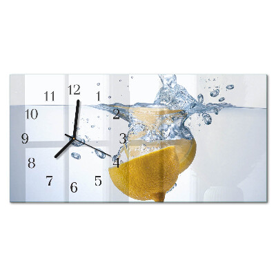 Orizzontale orologio da parete Una fetta di limone in acqua