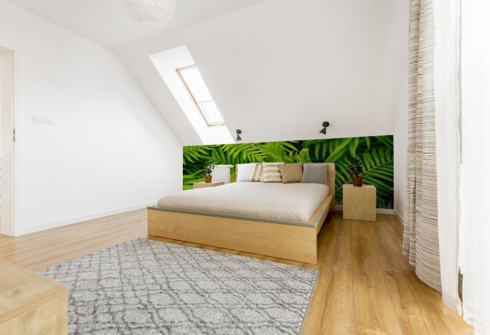 sistemazione di una camera da letto in mansarda